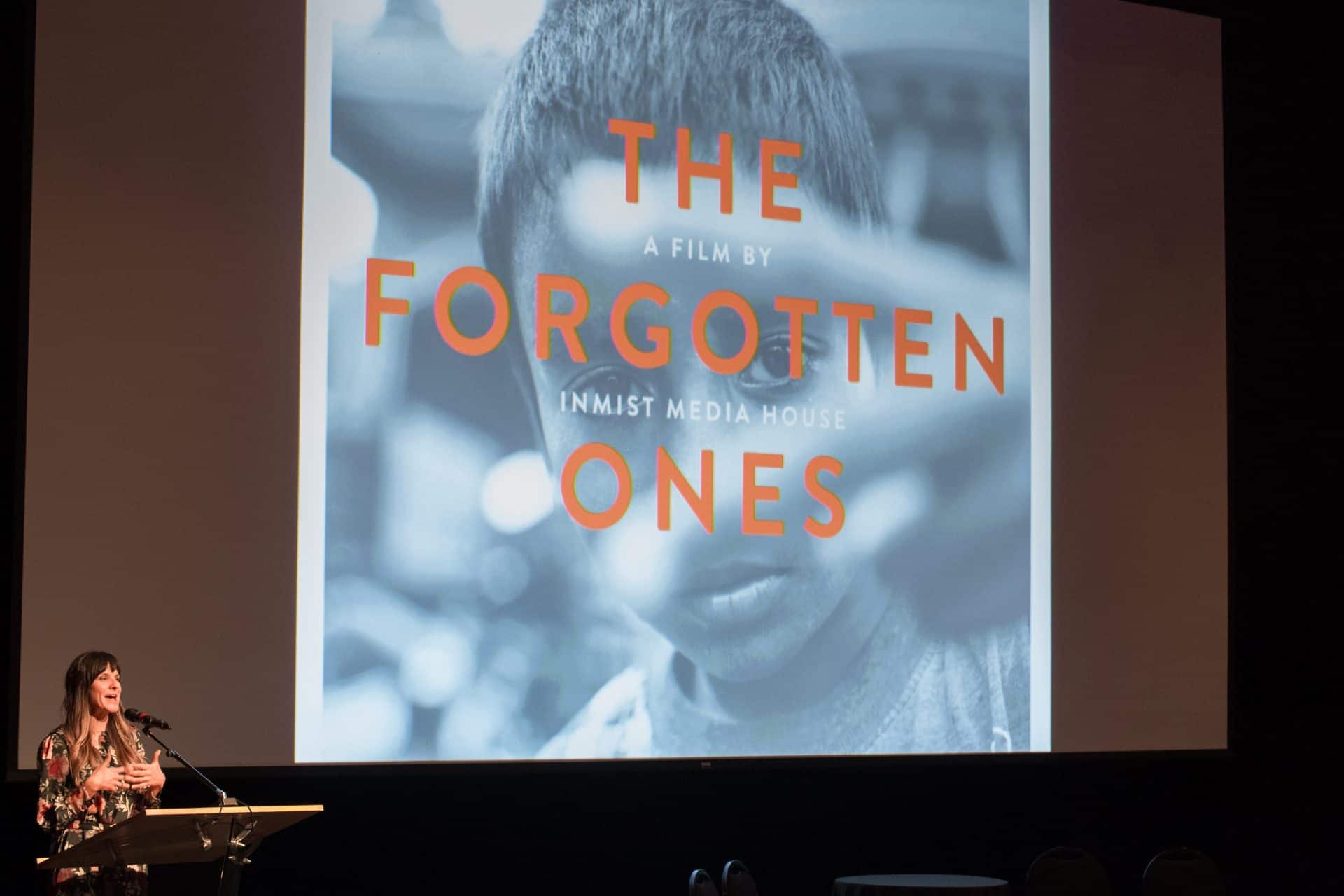 Himalayan Life board member Heidi Epp talks to the audience at an HL screening of Forgotten Ones in West Vancouver, BC Canada where HL is located